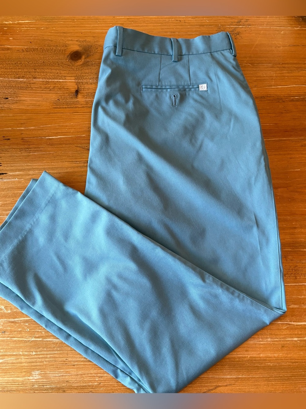 Peter Millar men’s light Performance golf pants. Sharp light blue w/logo. 42/30
